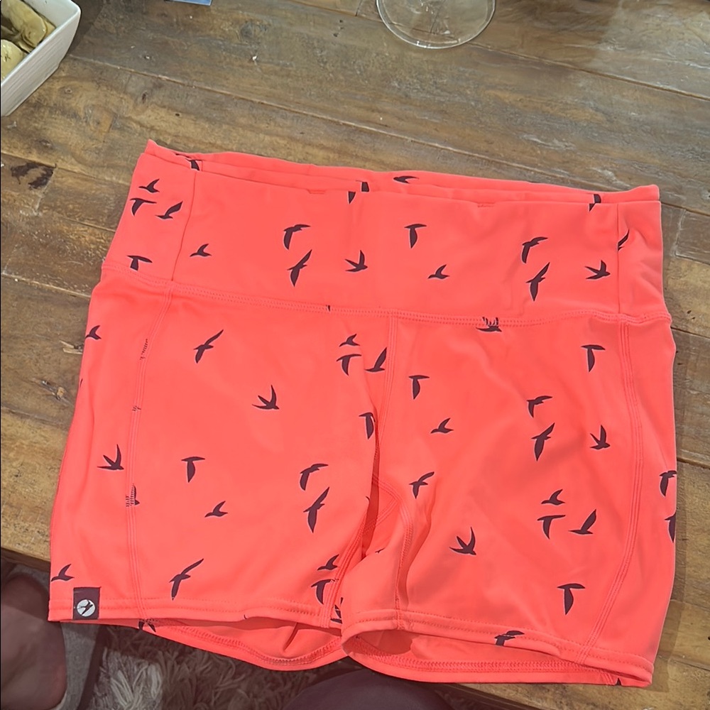 Oiselle Coral and Black Athletic Shorts with Geometric Pattern